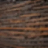 A collection of different types of railroad ties stacked neatly
