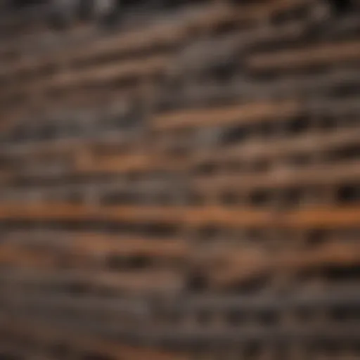 A collection of different types of railroad ties stacked neatly